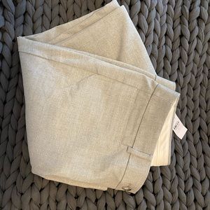 Light gray herringbone pants.